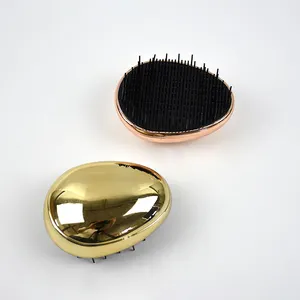 2020 New coming factory wholesale mini portable deft design electroplated cover Easter egg shape detangle hairbrush