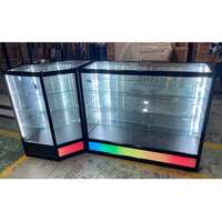 Vitrine autoportante en verre trempé durable, recyclable et écologique avec éclairage LED coloré, verrouillable, pour les magasins de tabac.