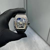 Montre de haute qualité RM 055 en fibre de carbone noire et dorée, les engrenages tournent, le volant oscillant tourne, revêtement bleu, étanche