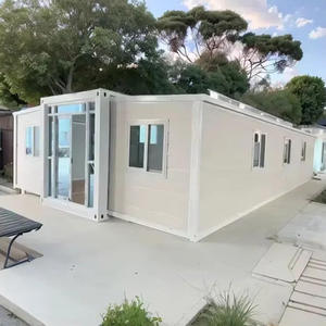 Casa contenedor extensible de acero-Casa prefabricada para edificios de oficinas y USO HOTELERO Diseño moderno Instalación rápida - Product Image 1
