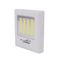 Lampe murale adhésive moderne à LED COB dimmable avec interrupteur tactile, alimentée par piles et minuterie, idéale pour armoire, placard, escalier et situations d'urgence