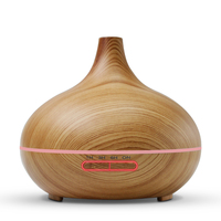 Diffuseur d'huiles essentielles Aroma Grain de bois Humidificateur ultrasonique silencieux à brume fraîche avec changement de couleur des lumières LED