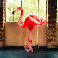 Flamant rose gonflable personnalisé en tissu Oxford avec logo sur mesure pour publicité commerciale saisonnière extérieure sur la plage