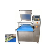 Machine automatique de remplissage et de décoration pour pâtisseries, desserts, pains, beignets, chocolats, confitures, crèmes et gâteaux de riz