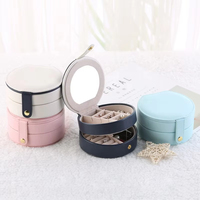 Mini boîte à bijoux de voyage en cuir PU Portable organisateur rond pour bagues boucles d'oreilles colliers bracelets pour emballage
