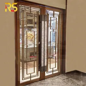 Foshan moderna decorativa in acciaio dorato porta d'ingresso in vetro porta del garage per hotel
