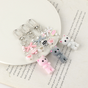 Mignon chaton porte-clés floqué en peluche jouet pendentif avec arc perlé chat arc porte-clés pour télé<span class=keywords><strong>phone</strong></span> portable caméra sac pendentif breloques