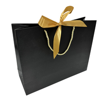 Sac de shopping pliable en papier kraft noir, biodégradable, écologique, durable, résistant à l'humidité, pour vêtements et bijoux