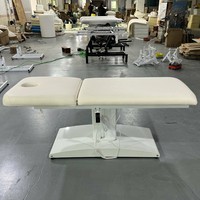 Table de soin électrique haut de gamme en cuir PU pliable et portable pour hôtels et salons de beauté, avec excellente capacité de rangement