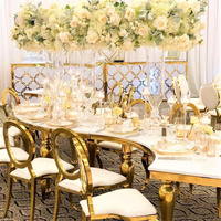 Chaises et tables de mariage en forme de S dorées et blanches pour les événements de mariage