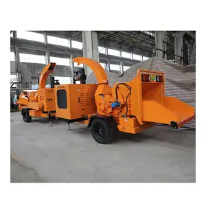 Green waste tree branches wood chipping shredder