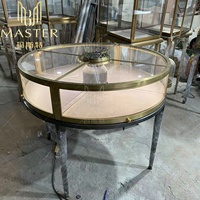 Qualität Full Assem ble Produkt Display Table Gebogenes Display aus gehärtetem Glas Vitrine Zweifarbiges Design Runde Schmuck Vitrine