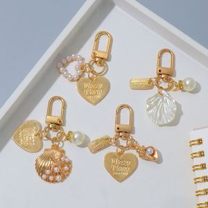 Llavero de moda con diseño de dibujos animados, mosquetón, letras metálicas, etiquetas de corazón, para mujer, niña, bonito, color dorado, accesorios de joyería - Product Image 1