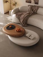 Table basse rotative italienne moderne et simple Meubles de maison en forme de galet pour petit appartement Salon Design