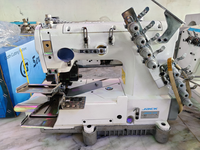 Machine à coudre industrielle Jack JK8009VCDII-0464P à 4 aiguilles pour la pose de ceintures de jeans, de bandes élastiques et de rubans