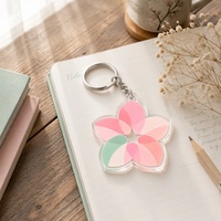 Porte-clés en acrylique transparent personnalisé OEM, design fleur à cinq pétales, anneau métallique, fournisseur en gros de marchandises florales personnalisées