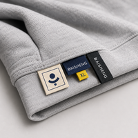 Fabricante de Etiquetas OEM con Etiquetas Tejidas Jacquard Gráficas Suaves, Lavables, de Alta Tenacidad, de Poliéster Reciclado para Sudaderas con Capucha para Hombre
