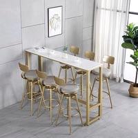 Table de bar moderne de luxe avec deux tabourets hauts pivotants, structure en métal, pour la maison, les hôtels, les centres commerciaux dans un décor de salle à manger élégant