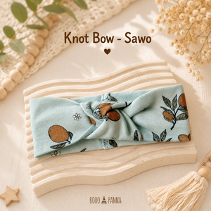 Adorable sapodilla knot bow with soft fabric secure fit and timeless elegance perfect for parties photos and everyday styling - Product Image 6