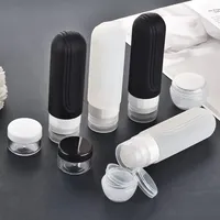 Ensemble de voyage de 90 ml en quatre pièces, approuvé par la TSA pour l'avion, anti-fuite, rechargeable, en silicone, kit de bouteilles de toilette écologiques