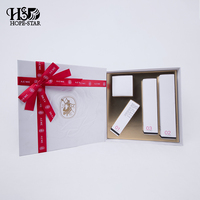 Boîte cadeau rigide blanche de luxe personnalisée avec ruban rouge et nœud pour emballage de coffret cosmétique et soins de la peau, logo en feuille d'or, vente en gros usine