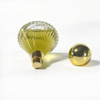 Vente en gros de flacons de parfum de luxe transparents à rayures avec pompe pulvérisatrice, emballage en verre de 50 ml, flacon de parfum unique
