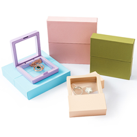 Boîte d'emballage de luxe 2026 pour bijoux (colliers et bagues) en carton ondulé auto-érectible, personnalisée avec suspension en film PE transparent