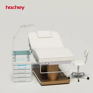 Table de massage pour salon de beauté HOCHEY en cuir latex blanc 3 moteurs lit à cils électrique avec base dorée et chaise de technicien