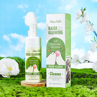 Vente en gros de shampooing sec sans rinçage Nice Kiki avec brosse en silicone pour chiens et chats, hydratant, nettoyage en profondeur, soin des pattes