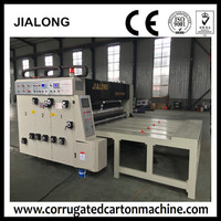 Machine d'impression flexographique à alimentation par chaîne à 4 couleurs avec rainureuse et découpeuse