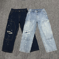 Jean à effet éclaboussures de peinture pour homme, en denim bleu clair délavé, coupe ample à jambe large, avec panneau de poches utilitaires sur la cuisse
