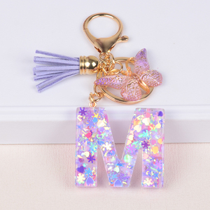 Llavero Morado con Letra Inicial para Bolso A-Z 26 Palabras en Inglés Borla de Mariposa Resina con Lentejuelas Llavero con Letra del Alfabeto para Mujer - Product Image 5