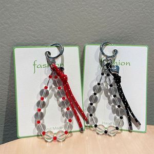 Chaîne de téléphone en corde de nylon avec perles acryliques transparentes, plaqué argent, motif cœur, pour cadeau de bijoux mignon, vente en gros - Product Image 1