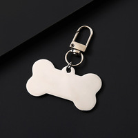 Porte-clés en acier inoxydable vierge finition miroir en forme d'os, personnalisable par impression laser et UV, logo sur mesure, vente en gros