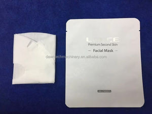 Machine de pliage et d'emballage automatique de masques faciaux Yunqingtech, machine de remplissage et de scellage de masques avec système pneumatique - Product Image 2