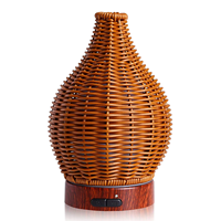 Diffuseur d'huiles essentielles en rotin plastique électrique OEM 100 ml, lumière nocturne, humidificateur à brume fraîche, tissage en bois, pour la maison