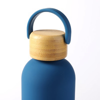 Nouvelle gourde de sport d'extérieur au design moderne, avec poignée portable et couvercle en bambou, isolée sous vide, personnalisable avec LOGO