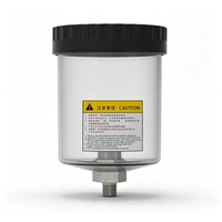 Bouchon à vis nervuré transparent avec étiquette de précaution pour gobelet d'huileur à liquide pour système de lubrification MQL