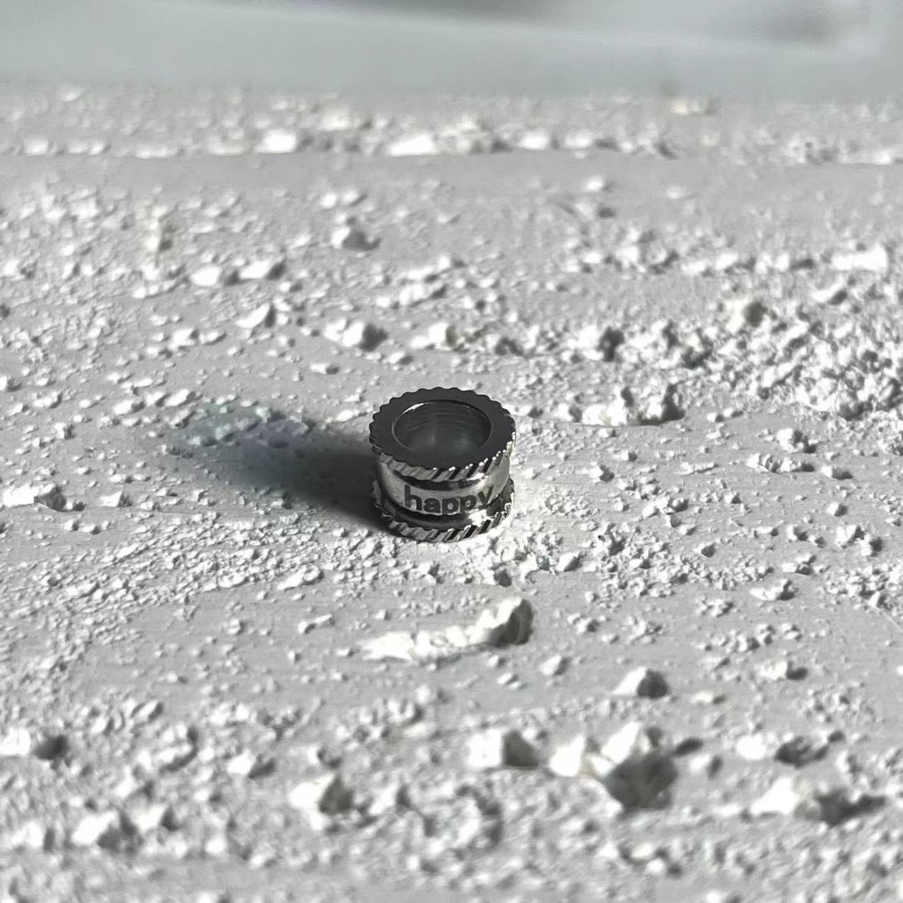 Letras enrollables color acero (feliz)