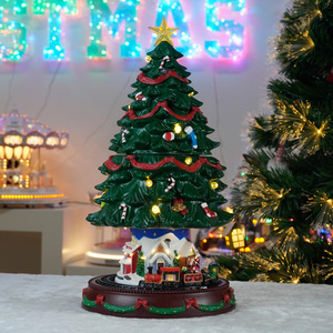 Aldea Animada de Plástico con Árbol de Navidad que Sube y Baja y Tren Giratorio con Luz LED y Música Decoración Navideña - Product Image 4