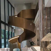 Escalier en colimaçon métallique de Hangzhou avec rampe en verre, personnalisé pour villa duplex, style simple et luxe léger, installation à l'entrée