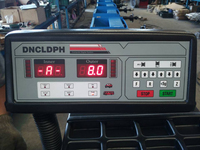Machine d'alignement et à équilibrage pour pneus lourds, pour la réparation de camions