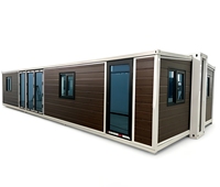 Maison conteneur pliable à double aile extensible avec panneaux en grain de bois, maison mobile préfabriquée avec porte en verre