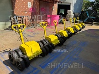 Machine à rouler électrique personnalisée SHINEWELL, rouleau à double roue de haute qualité pour jeux gonflables, vente en gros