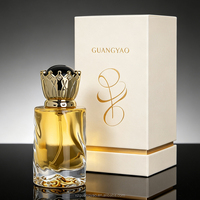 Flacon de parfum de luxe violet avec vaporisateur 100 ml, bouchon couronne doré et boîte d'emballage violette disponibles. Échantillons gratuits disponibles.