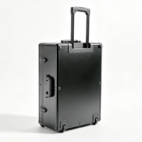 Valise trolley en aluminium noir personnalisée avec roulettes, poignée télescopique et EVA découpé, valise en aluminium à roulettes avec couvercle alvéolé