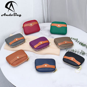 กระเป๋าใส่เหรียญ AndoBag รุ่นมินิสำหรับผู้หญิง หนังวัวแท้ แฟชั่นเรียบง่าย กระเป๋าใส่เหรียญแบบซิป พร้อมช่องใส่บัตรและพวงกุญแจ รุ่น 1019 - Product Image 1