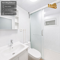 Maisons miniatures personnalisées prêtes à être expédiées, maison-conteneur en bois grainé de 20 pieds, cadre blanc, toit en pignon, véranda, design moderne, utilisation hôtel/villa