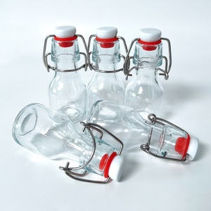 Envase de Vidrio Reutilizable con Tapa Abatible y Tapón de Goma Hermético para Almacenamiento de Té Frío, Aceite de Oliva, Vinagre y Condimentos de Cocina - Product Image 2