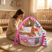 Tapis d'éveil 5-en-1 rose pour bébé, thème friandises, avec anneau de dentition intégré de qualité alimentaire, centre d'activités et fosse à balles rembourrée lavable